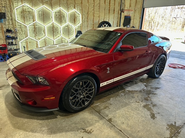 Red performance car detailed in the ABR Exclusives shop